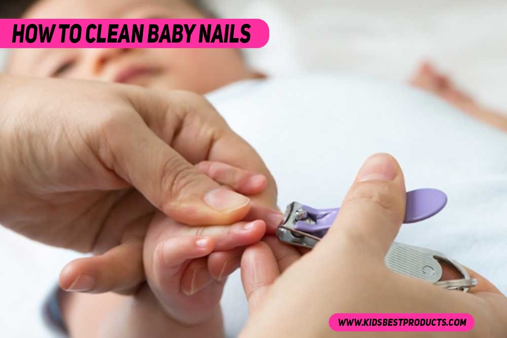 Parent trimming baby nails with electric trimmer